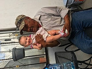 Carmen joined the competition — help win amazing prizes! baby, baby_products, baby_toddler_clothing, child, comfort, elbow, fun, gesture, headwear, joy, person, room, service, toddler, water_bottle