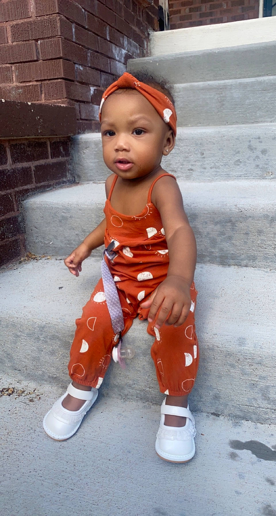 Kirah joined the competition — help win amazing prizes! arm, baby, baby_toddler_clothing, brick, brickwork, costume, fashion_design, hand, happy, head, human_body, human_leg, lip, orange, person, red, sleeve, thigh, toddler, trunk