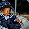 J'Alani joined the competition — help win amazing prizes! baby, child, infant, portrait, sitting, wicker_chair, navy_dress, bonnet, bow, curly_hair, smiling, indoor, furniture, basket, fashion, formalwear, photography, dark_blue, adorable, home_interior