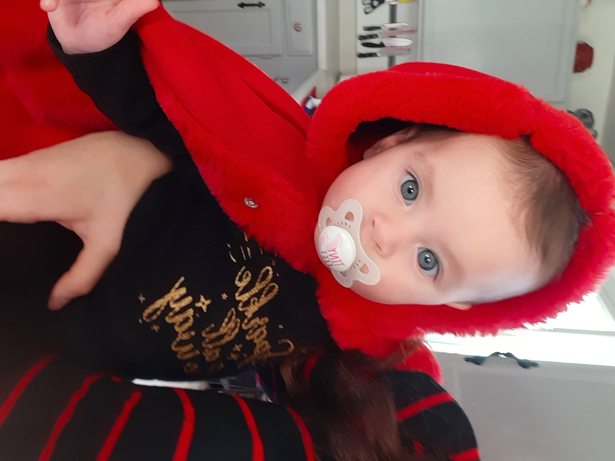 Alina joined the competition — help win amazing prizes! baby, baby_toddler_clothing, carmine, child, christmas, christmas_eve, costume, costume_hat, event, fictional_character, fun, fur, gesture, hat, holiday, person, red, room, toddler, window