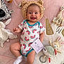 Rose a rejoint le concours — aidez-le/la à gagner de superbes lots ! baby, infant, smile, onesie, rainbow_pattern, plush_toy, giraffe_toy, bunny_toy, blanket, soft_toys, lying_down, cute, happy, child, sock, baby_clothing, indoors, playful, head_support, colorful