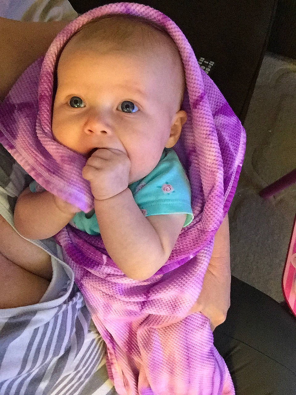 Jurnie is registered to the contest to win money with this photo: baby, baby_products, cheek, child, eye, face, hand, head, lip, mouth, neck, nose, person, pink, purple, skin, smile, toddler