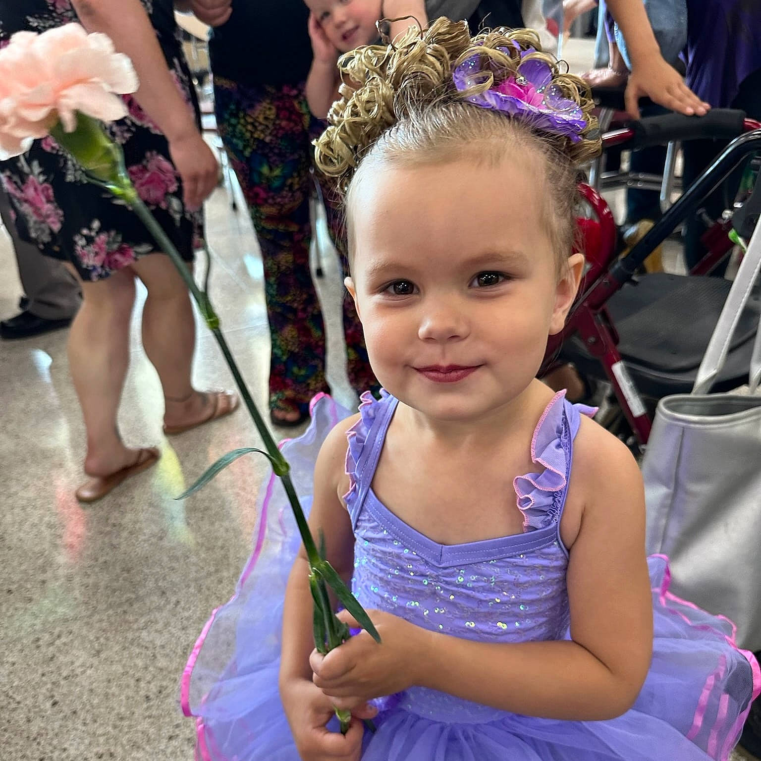 Octavia is registered to the contest to win money with this photo: costume, event, facial_expression, fashion_accessory, fun, hairstyle, happy, headwear, jewellery, joy, magenta, necklace, people, person, photograph, pink, public_event, purple, smile, snapshot