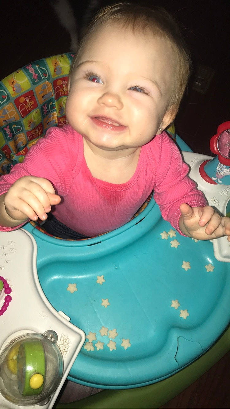 Bryleigh joined the competition — help win amazing prizes! baby, baby_laughing, baby_products, baby_toddler_clothing, bib, ceramic, cheek, child, couch, dishware, kitchen_utensil, laugh, person, serveware, sitting, spoon, toddler, tooth