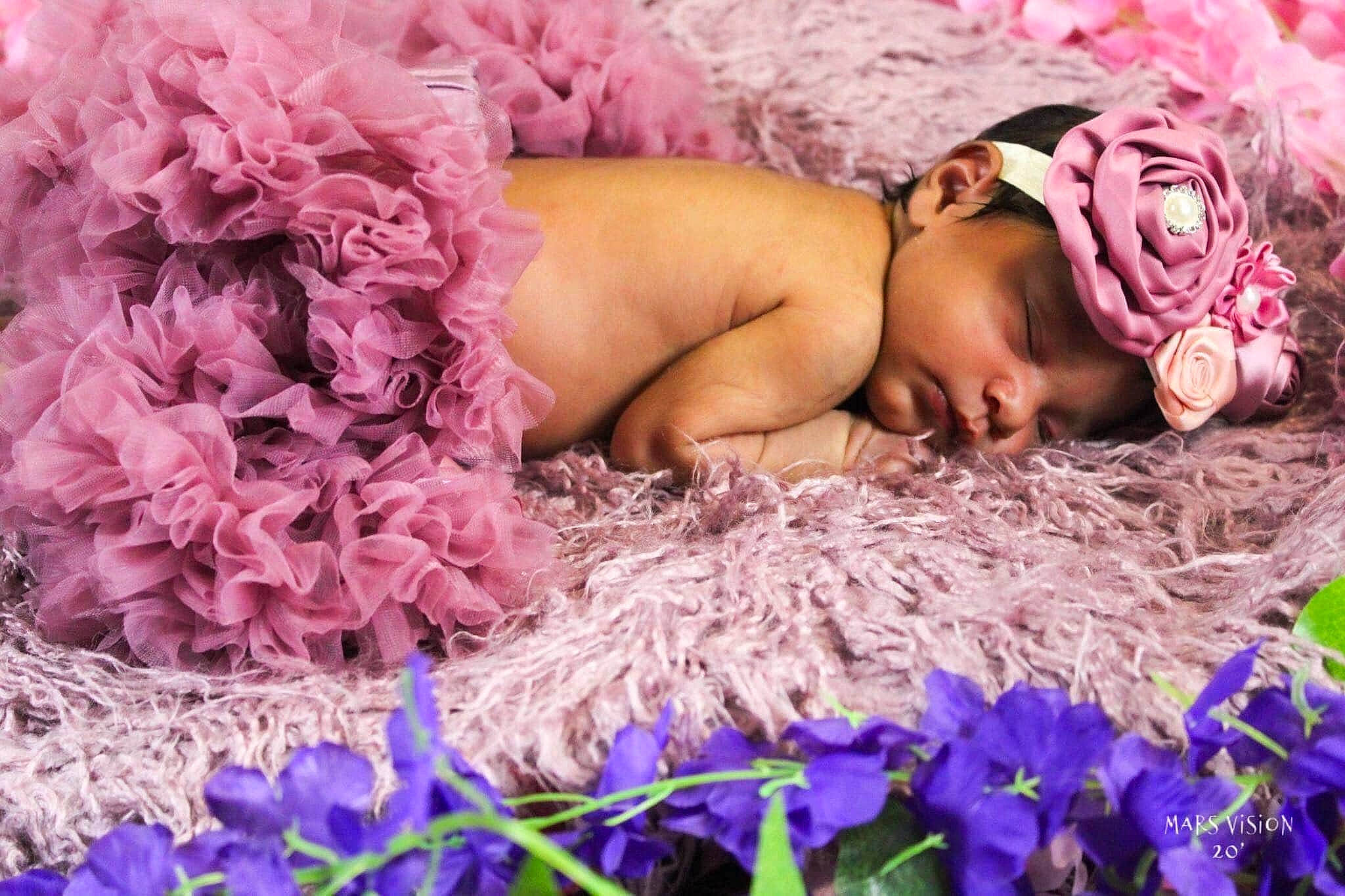 Daliylah joined the competition — help win amazing prizes! baby_sleeping, beauty, bedtime, eye, eyelash, flower, flowering_plant, hair_accessory, headwear, human, lavender, mammal, mouth, nap, nose, person, petal, photography, pink, purple