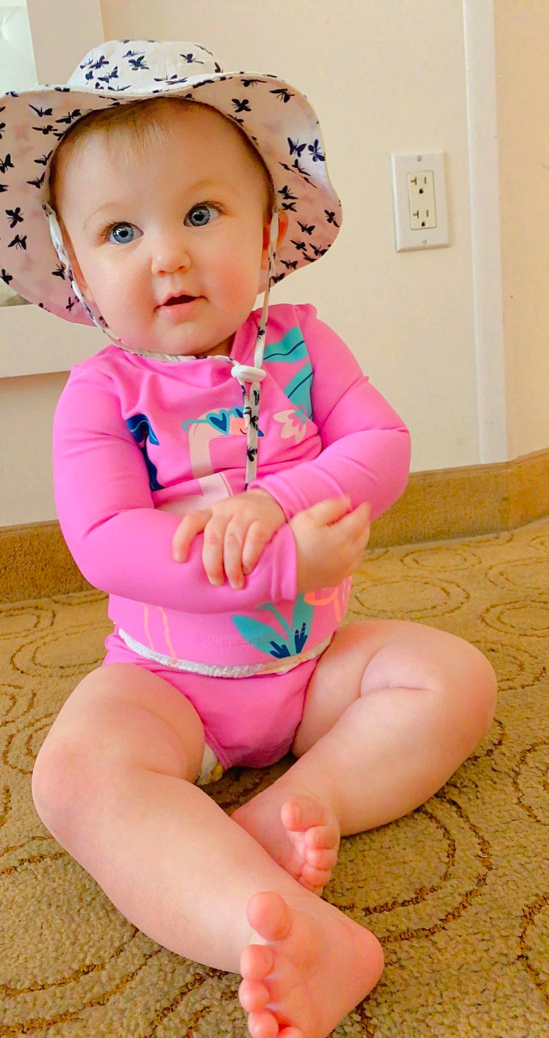 Marlowe joined the competition — help win amazing prizes! baby, baby_toddler_clothing, cheek, child, face, facial_expression, finger, happy, head, human_leg, knee, leg, light_switch, magenta, neck, person, pink, skin, sleeve, thigh