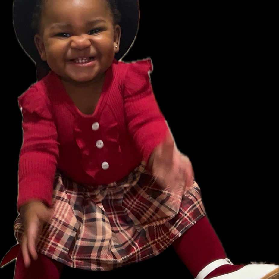Na'Zaria joined the competition — help win amazing prizes! toddler, child, smiling, red_sweater, plaid_skirt, white_shoes, hat, happy, portrait, cute, fashion, studio, black_background, young_child, person, clothing, feet, hands, sitting, face