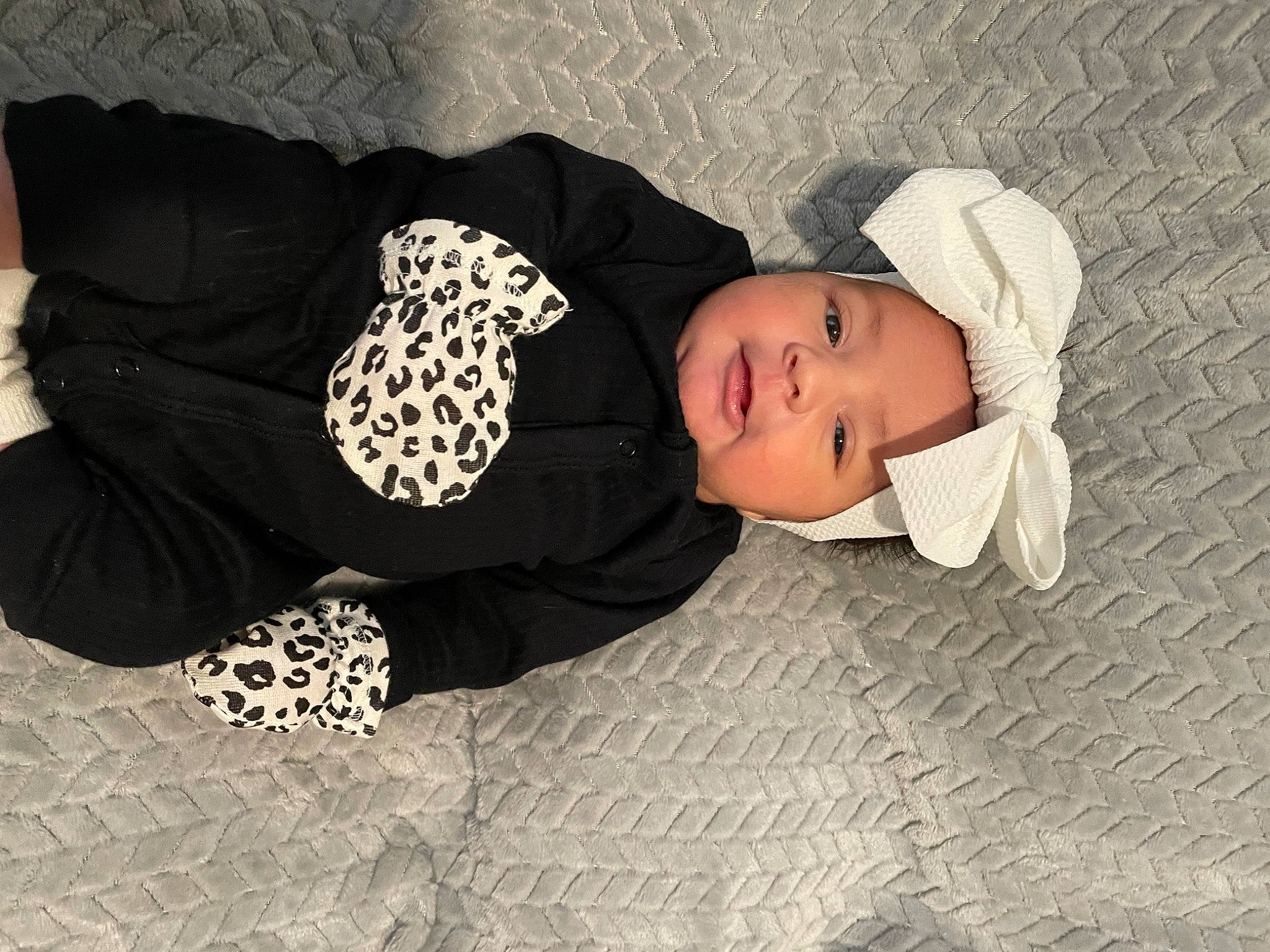 Hevnlyn Soul is registered to the contest to win money with this photo: baby, baby_products, baby_sleeping, baby_toddler_clothing, child, comfort, fashion_accessory, flooring, head, headgear, headwear, human_body, human_leg, linens, pattern, person, room, sleeve, textile, toddler