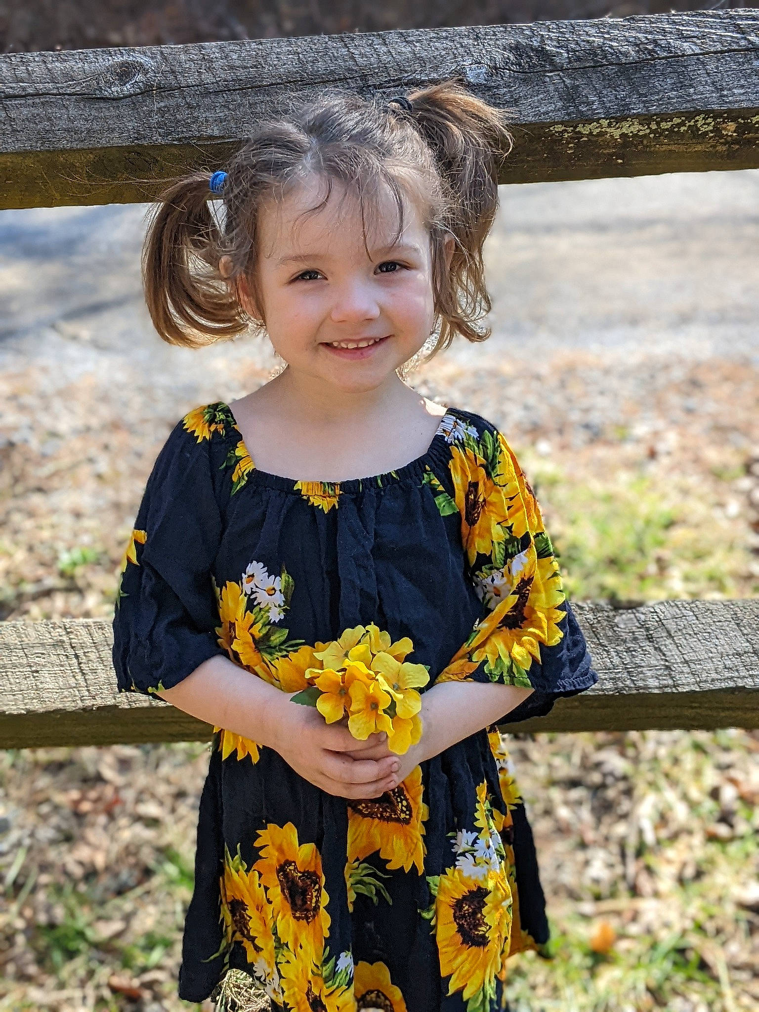 Adrian is registered to the contest to win money with this photo: baby_toddler_clothing, blond, child, day_dress, dress, face, fun, grass, happy, iris, joy, leisure, pattern, people_in_nature, person, plant, sleeve, smile, street_fashion, t_shirt