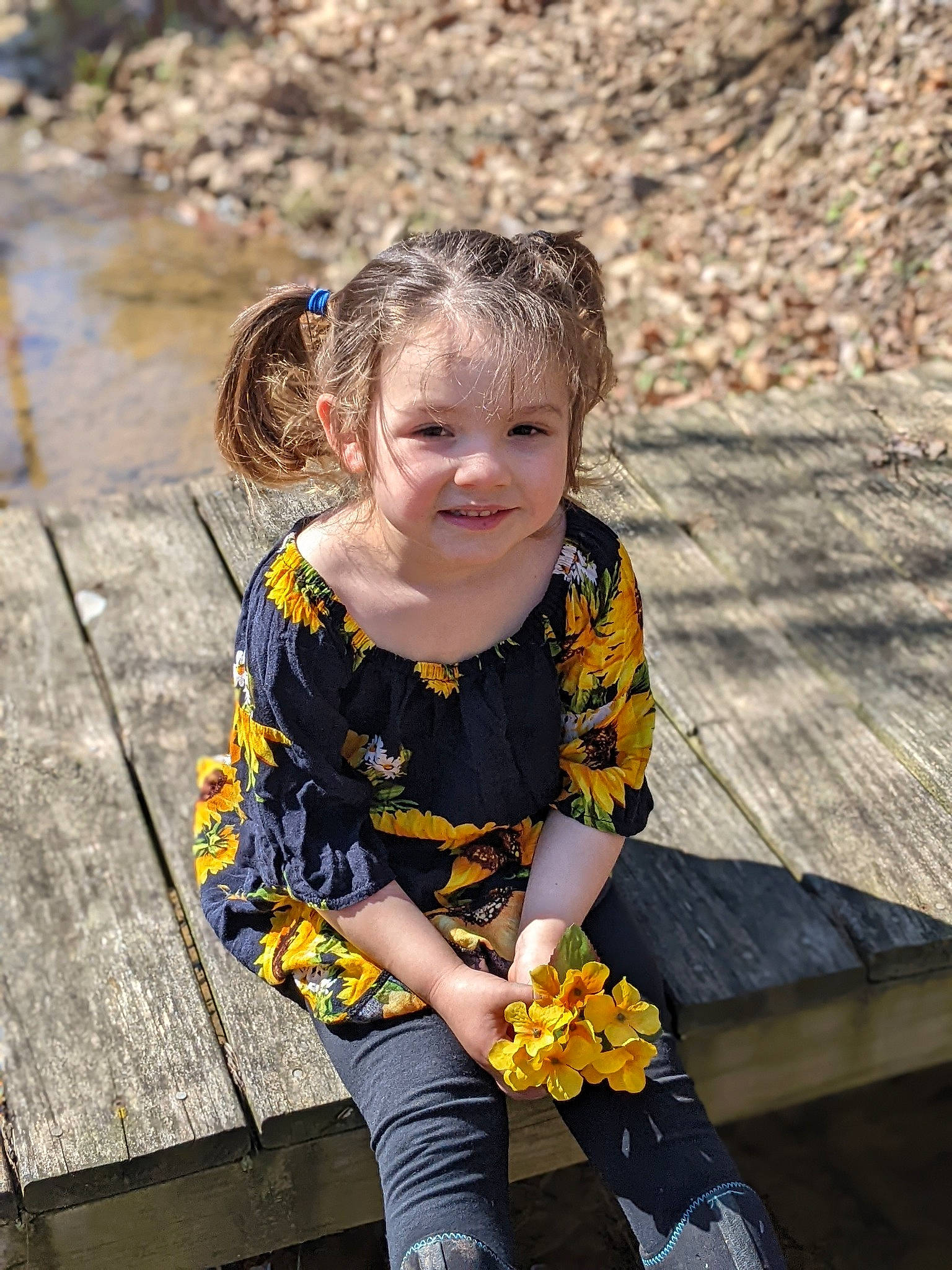 Adrian is registered to the contest to win money with this photo: blond, child, flower, fun, grass, happy, human, human_body, joy, leaf, leisure, pattern, people, people_in_nature, person, recreation, sitting, smile, spring, street_fashion