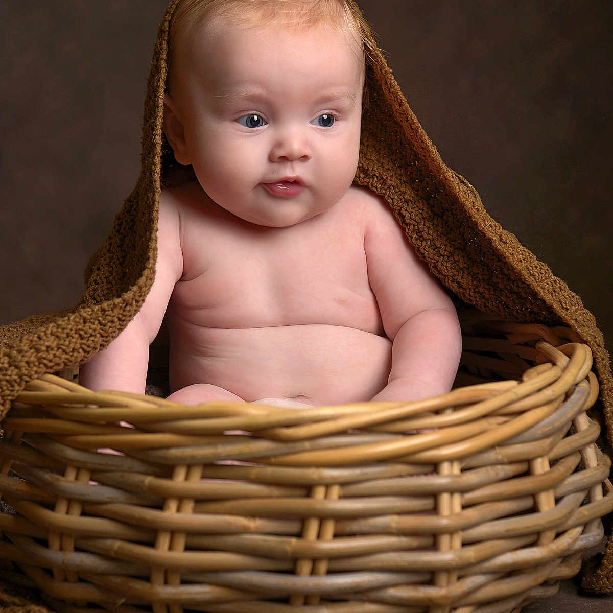 Harloe is registered to the contest to win money with this photo: baby, basket, bed, blanket, clothing, cradle, crib, face, furniture, hardwood, head, hood, infantbed, newborn, person, photography, portrait, towel, wood