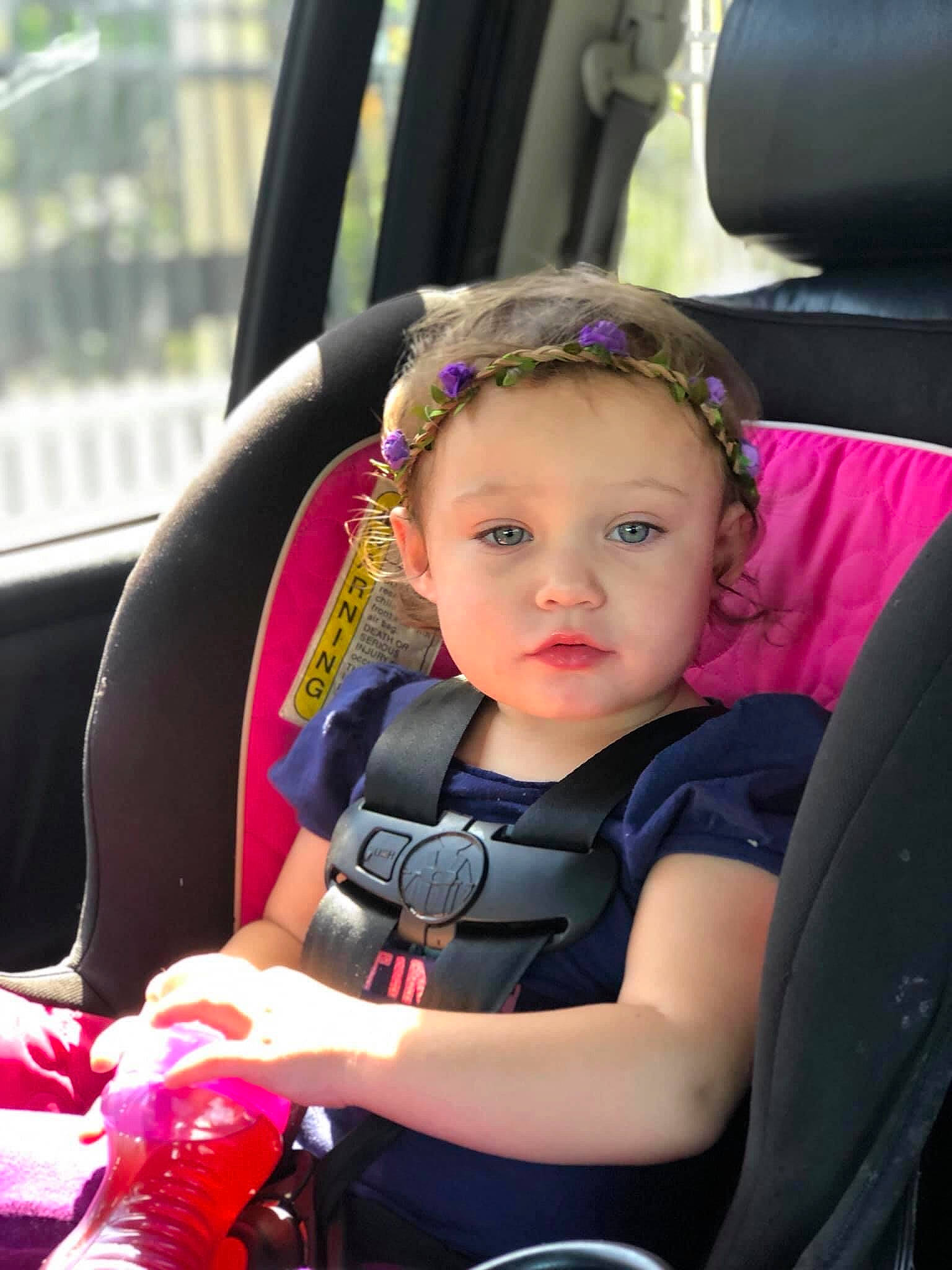 Brianna Rose joined the competition — help win amazing prizes! auto_part, baby, baby_carriage, baby_in_car_seat, baby_products, car, car_seat, child, fun, headwear, luxury_vehicle, person, pink, plant, product, sitting, skin, smile, steering_wheel, toddler