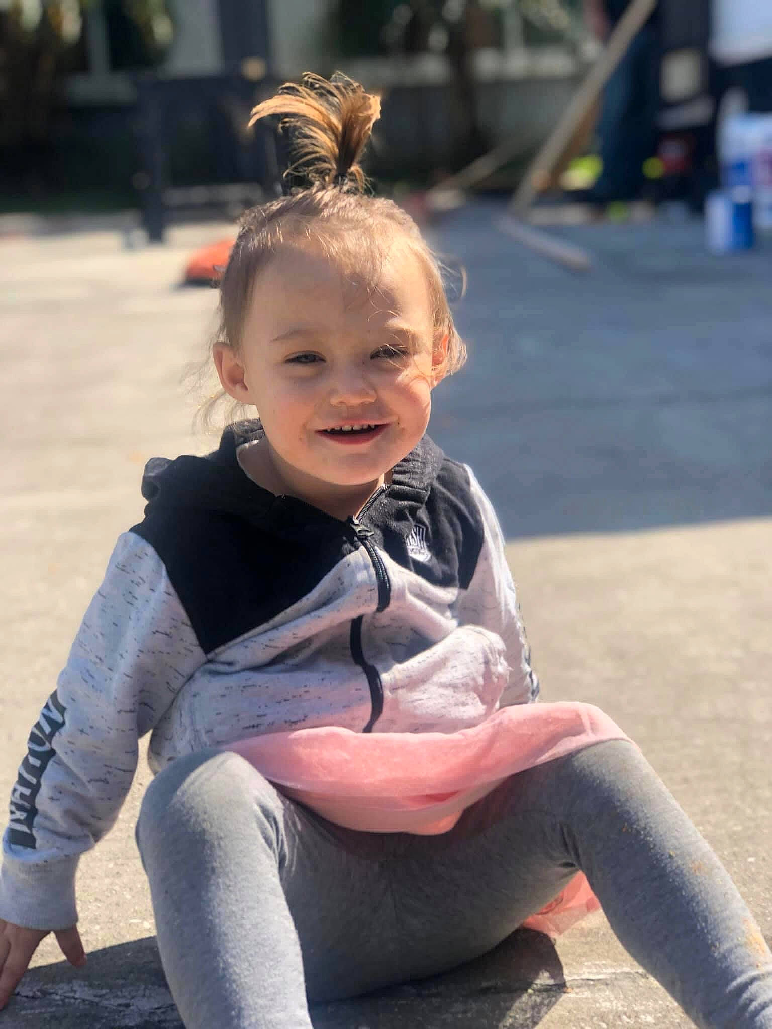 Brianna Rose is registered to the contest to win money with this photo: arm, blond, child, joy, person, sitting, smile, toddler, vacation