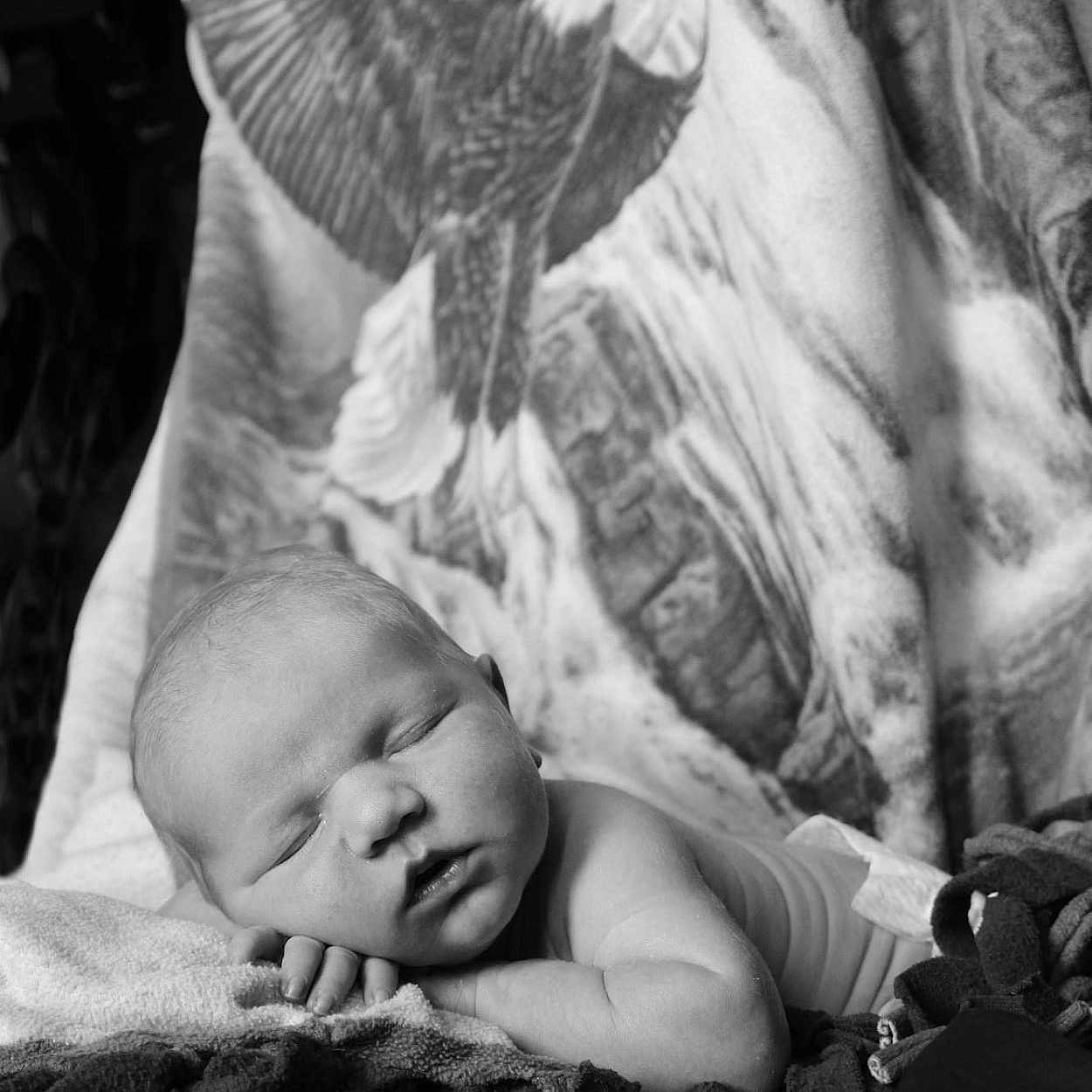 Tate is registered to the contest to win money with this photo: baby, bed, bedroom, blanket, clothing, cushion, face, furniture, head, homedecor, indoors, newborn, person, photography, portrait, quilt, room, skin, sleeping, tattoo