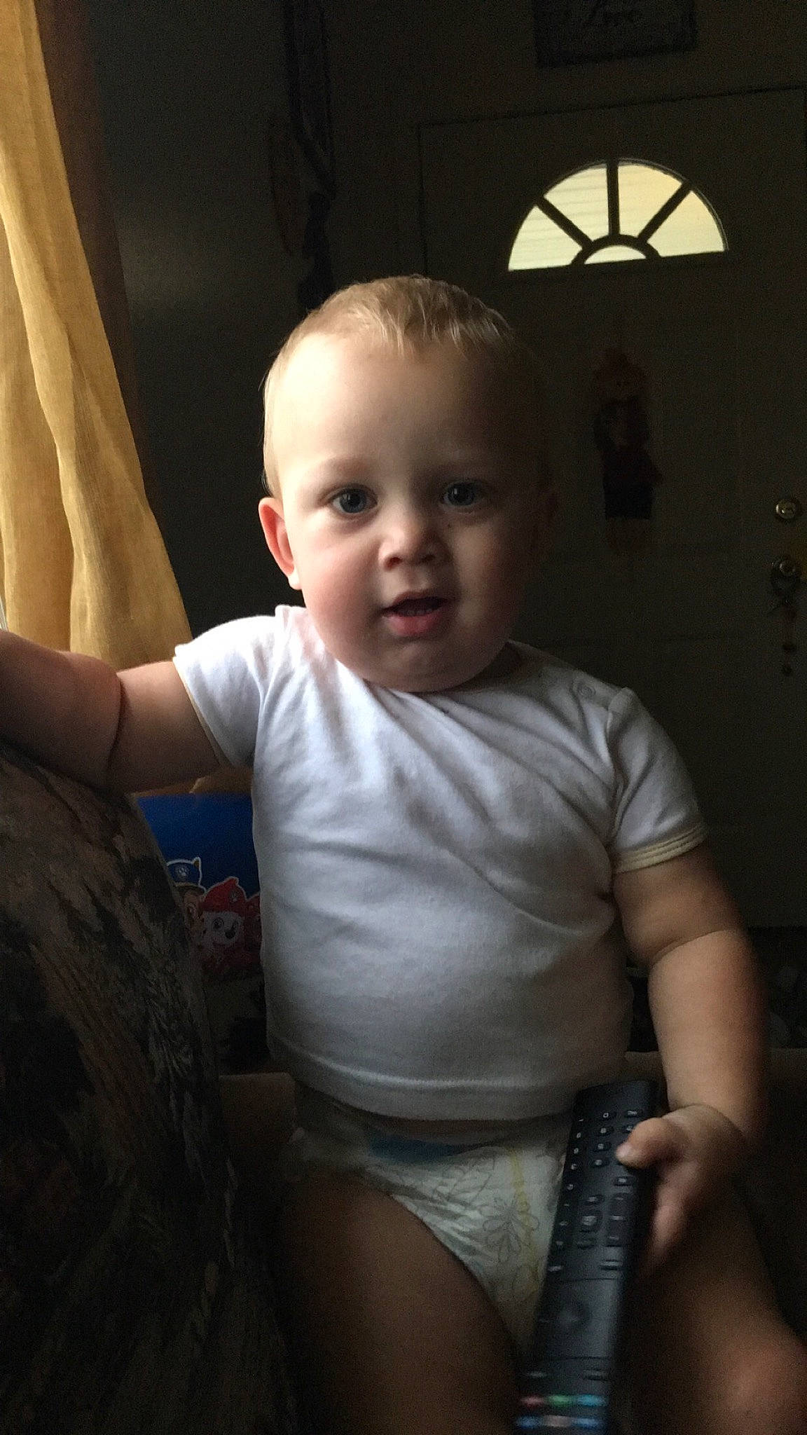 Justin is registered to the contest to win money with this photo: baby, baby_toddler_clothing, cheek, chin, comfort, eye, facial_expression, finger, flash_photography, gesture, hair, head, iris, joint, lighting, mouth, neck, person, shoulder, skin
