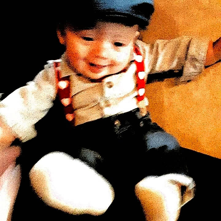 Landyn is registered to the contest to win money with this photo: arm, baby_toddler_clothing, cap, cheek, collar, costume_hat, eye, gesture, happy, hat, head, headgear, outerwear, person, skin, sleeve, smile, thigh, thumb, toddler