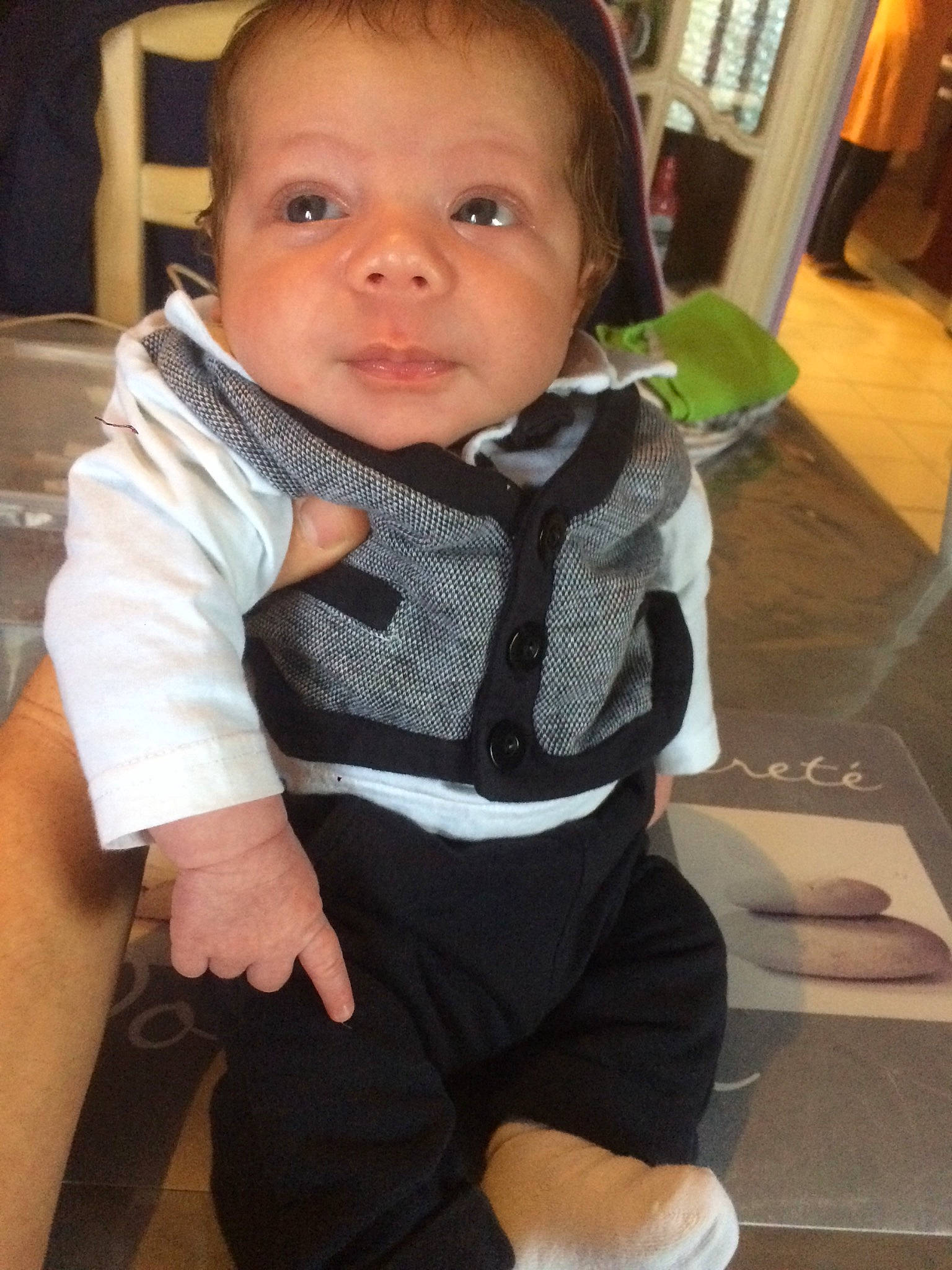 Illan participe au concours pour gagner de l'argent avec cette photo : baby, baby_carriage, baby_products, baby_toddler_clothing, cheek, child, head, leg, outerwear, person, product, sitting, skin, smile, toddler