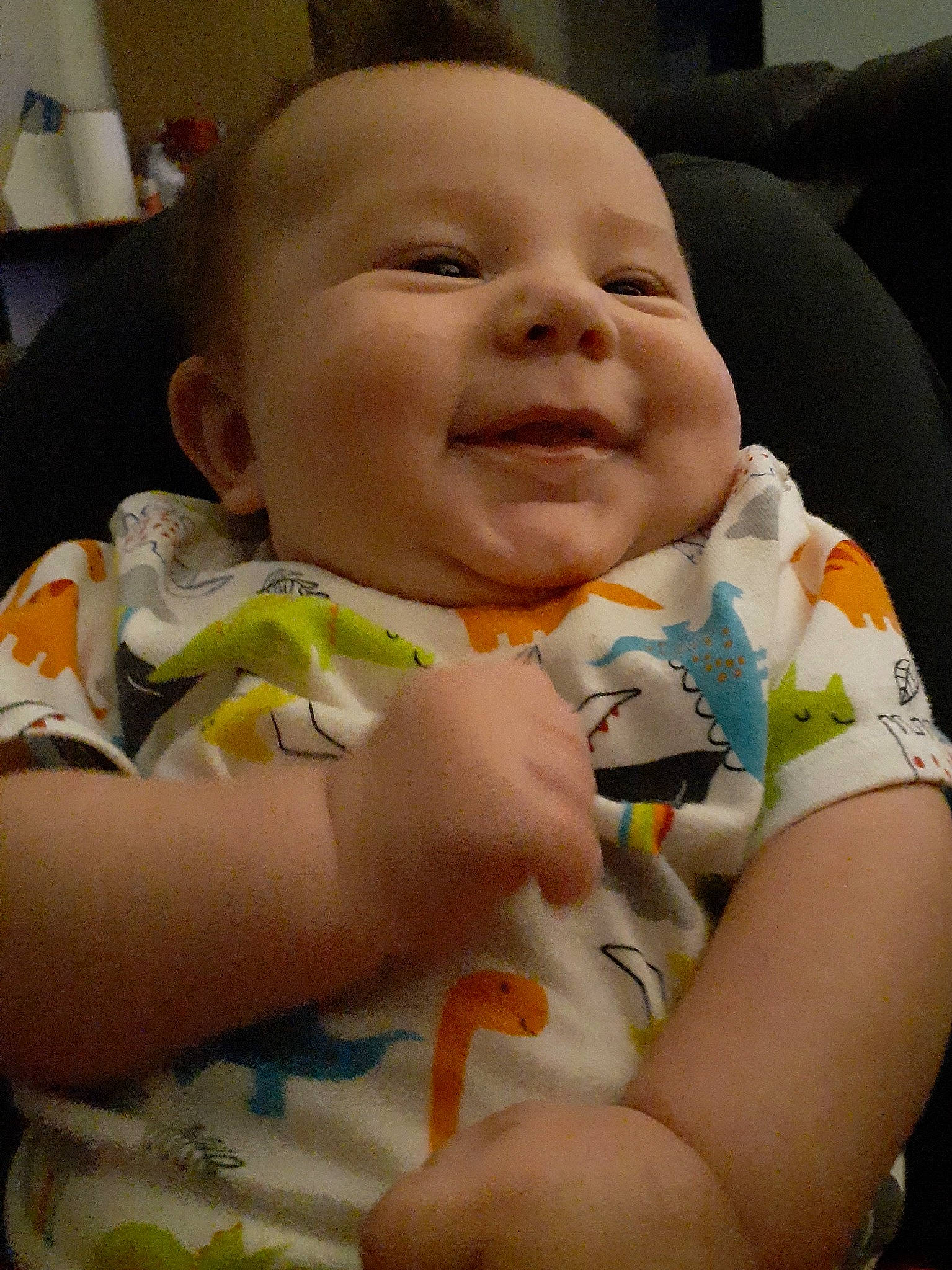 Derek is registered to the contest to win money with this photo: baby, baby_products, baby_toddler_clothing, cheek, child, comfort, dress, finger, gesture, happy, iris, lip, mouth, nail, nose, person, skin, sleeve, smile, thumb