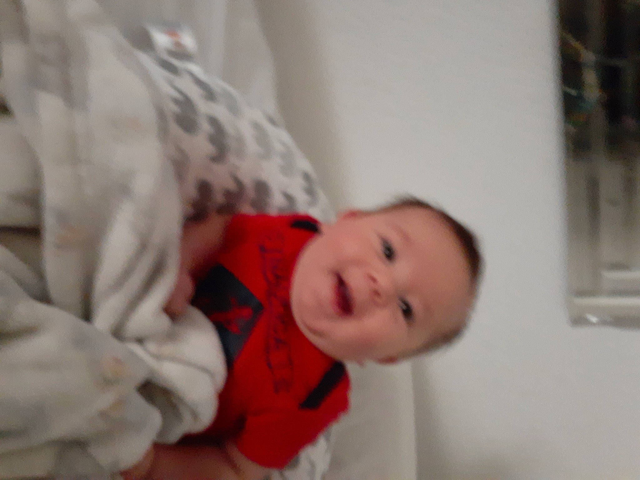 Derek joined the competition — help win amazing prizes! baby, baby_toddler_clothing, cheek, child, comfort, flooring, fun, fur, happy, linens, monochrome, monochrome_photography, person, portrait_photography, room, sitting, smile, toddler, tree, winter