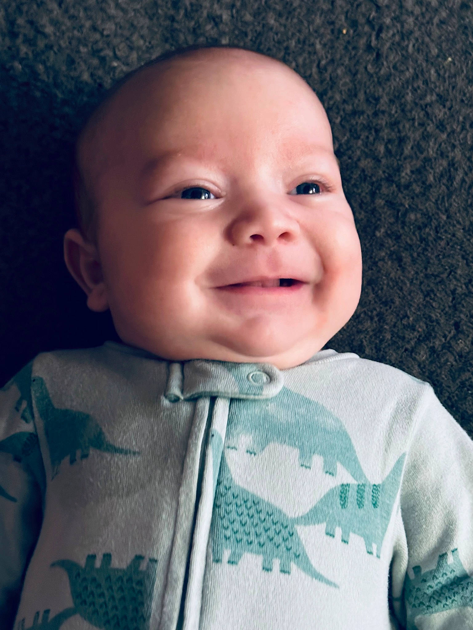 Colton is registered to the contest to win money with this photo: baby, baby_toddler_clothing, cheek, chin, comfort, eye, eyebrow, eyelash, forehead, happy, iris, joy, lip, mouth, nose, person, skin, sleeve, smile, textile
