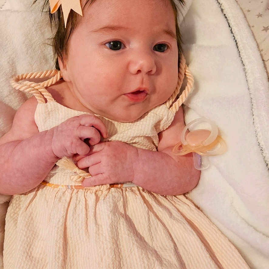 Summer-Rae joined the competition — help win amazing prizes! accessories, baby, bed, blanket, bodypart, bonnet, clothing, costume, dress, face, finger, furniture, hand, hat, head, homedecor, newborn, person, photography, portrait