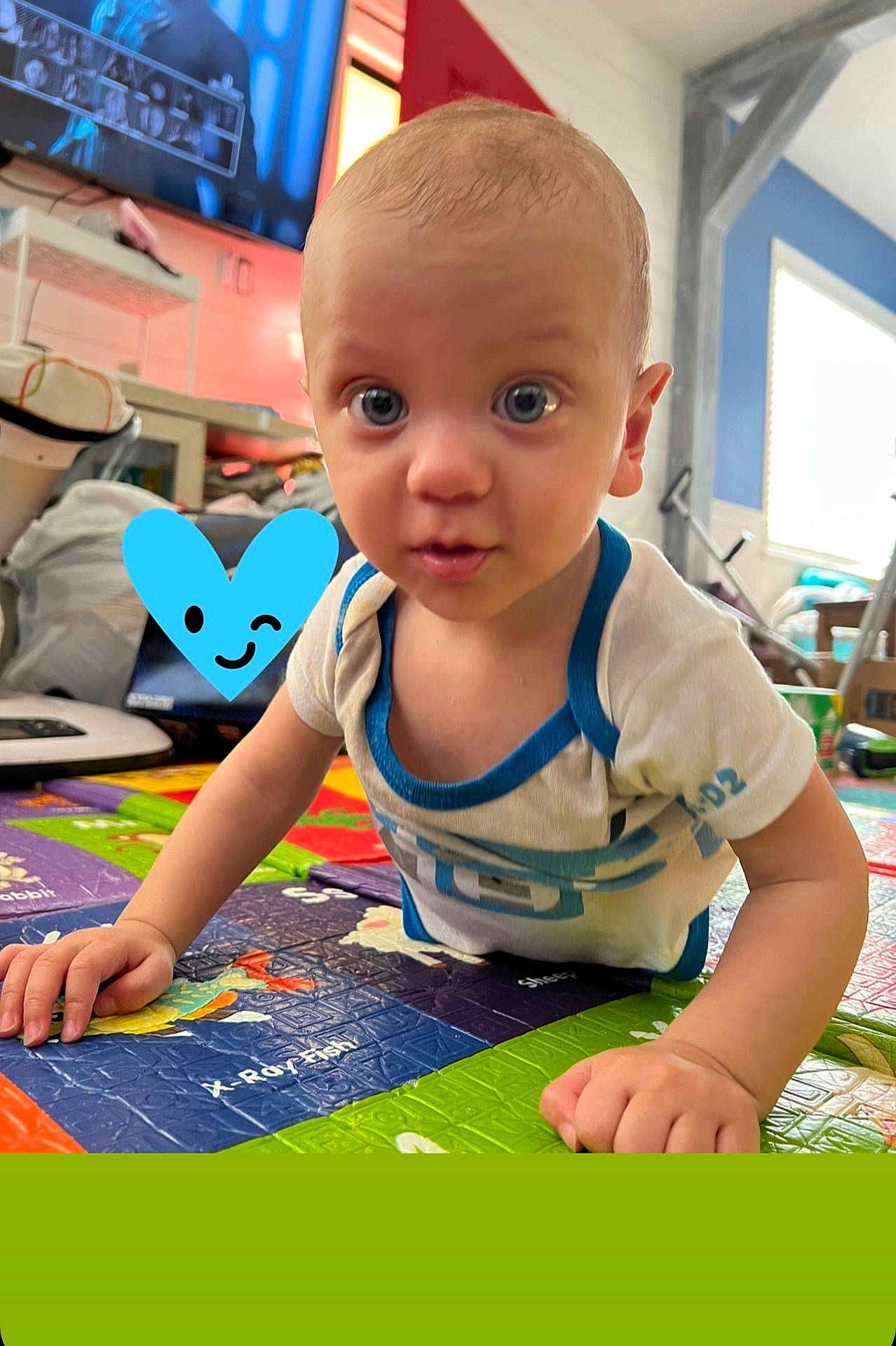 Gabriel is registered to the contest to win money with this photo: arm, baby, babycrawling, bodypart, clothing, computerhardware, crawling, electronics, face, finger, hand, hardware, head, monitor, person, photography, portrait, screen, t_shirt