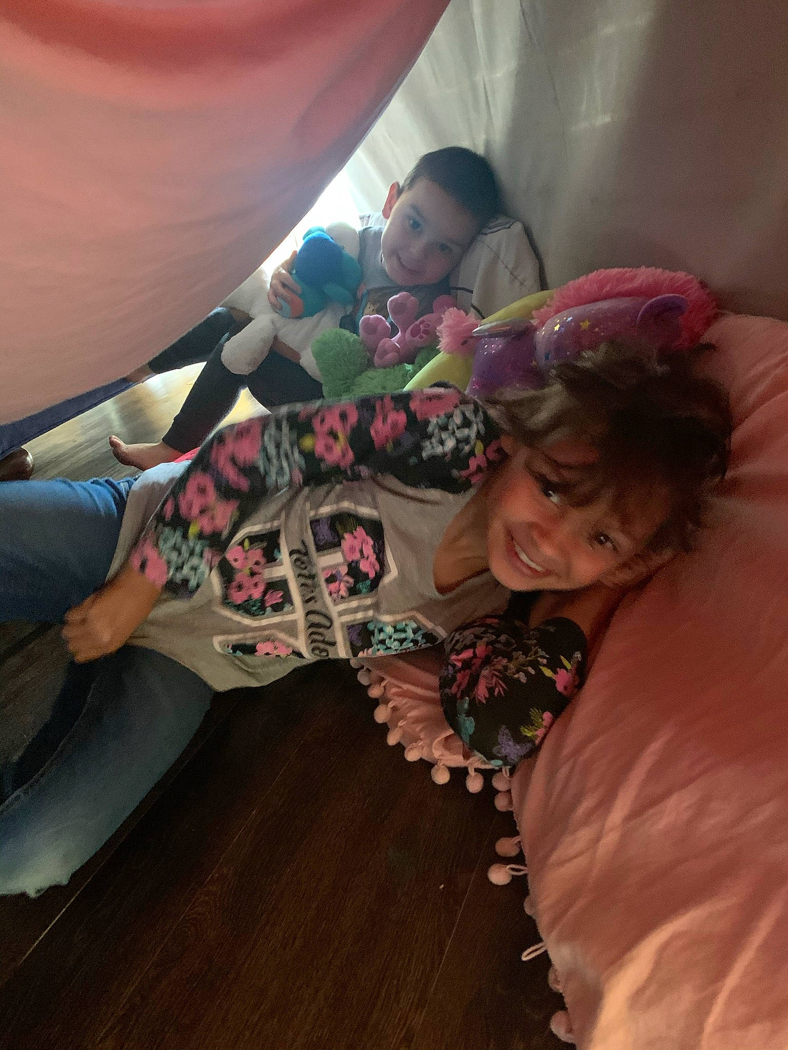 Giana is registered to the contest to win money with this photo: baby, child, comfort, event, flesh, fun, happy, joy, leisure, linens, magenta, mouth, pattern, person, play, room, sitting, smile, t_shirt, toddler