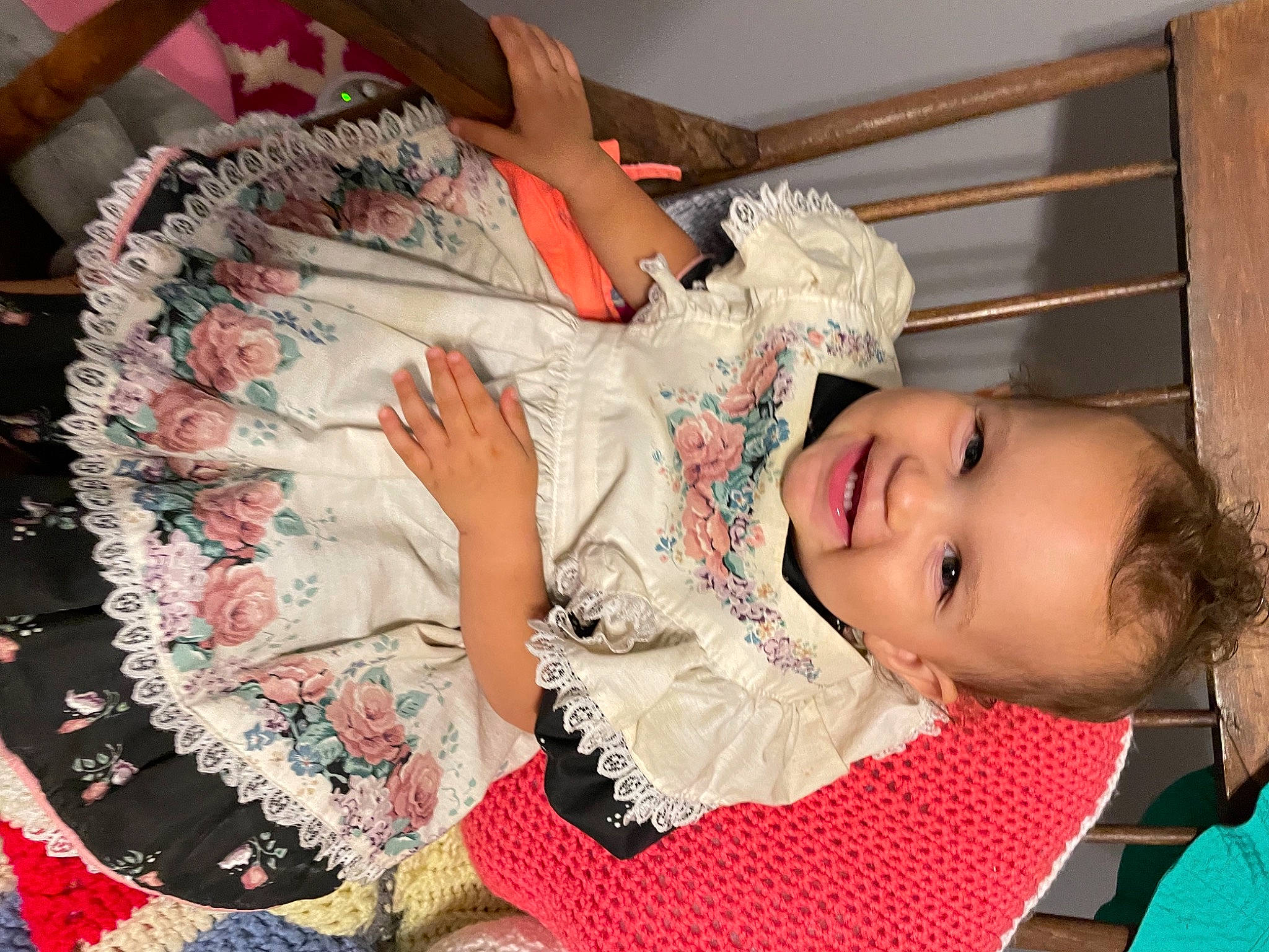 Kylie is registered to the contest to win money with this photo: baby, baby_toddler_clothing, child, comfort, dress, event, fashion, fashion_design, flesh, fun, happy, human, joy, pattern, person, pink, red, skin, sleeve, smile