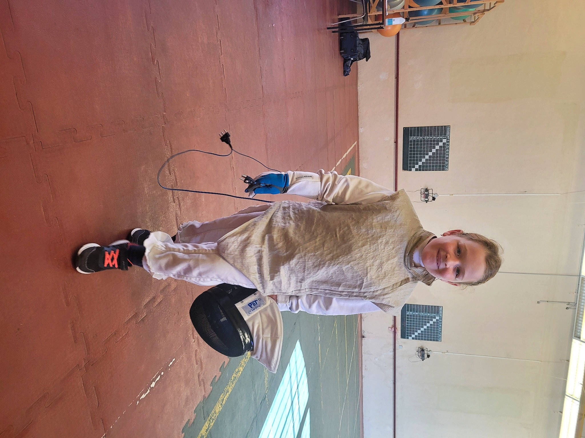 Emma participe au concours pour gagner de l'argent avec cette photo : building, ceiling, cleanliness, door, elbow, electrical_supply, electrical_wiring, engineering, flooring, joy, machine, outdoor_shoe, person, plaster, recreation, room, smile, walking_shoe, wire, wood