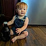 Graham joined the competition — help win amazing prizes! baby, barefoot, bottle, cabinets, casual, child, curious, denim, door, expression, face, floor, hand, indoors, overalls, person, red_hair, sitting, toddler, wooden_floor