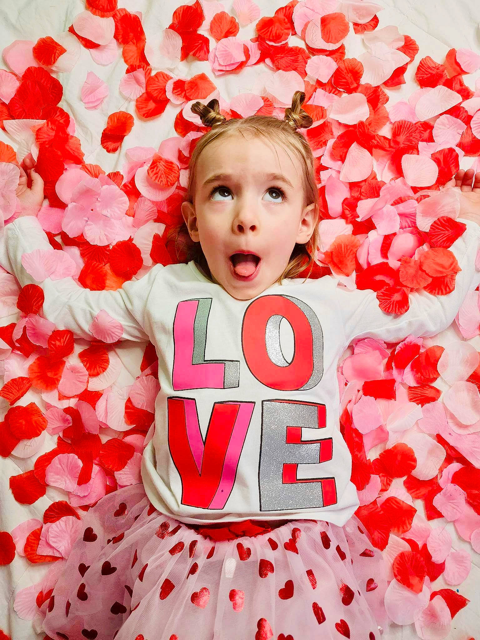 Amelia joined the competition — help win amazing prizes! baby, baby_toddler_clothing, carmine, child, design, event, facial_expression, font, happy, magenta, pattern, peach, people_in_nature, person, petal, pink, plant, red, sleeve, surprise