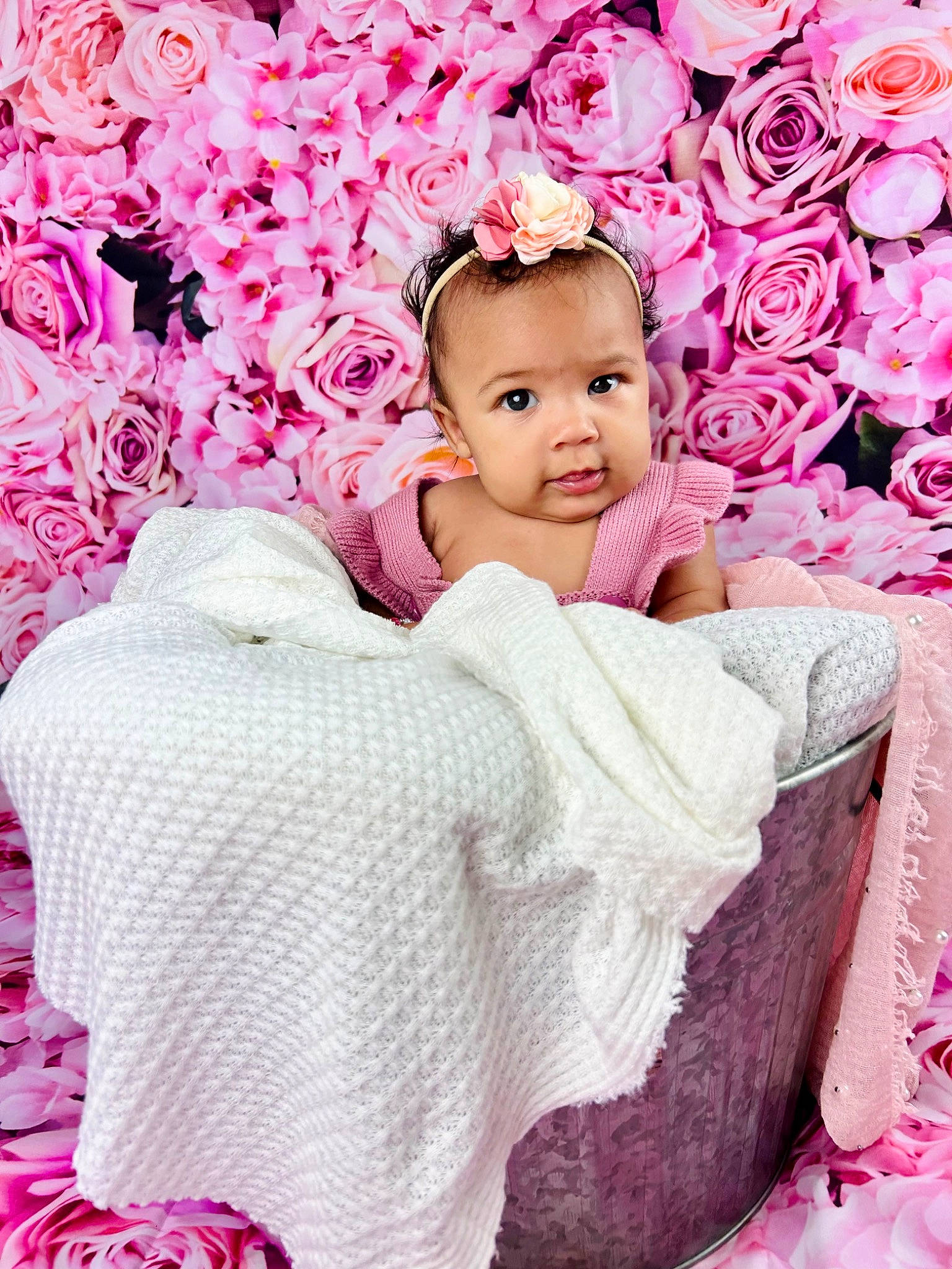 Lainey is registered to the contest to win money with this photo: baby, baby_toddler_clothing, beauty, child, comfort, cut_flowers, flower, flower_arranging, happy, linens, magenta, pattern, person, petal, pink, plant, purple, rose, textile, toddler