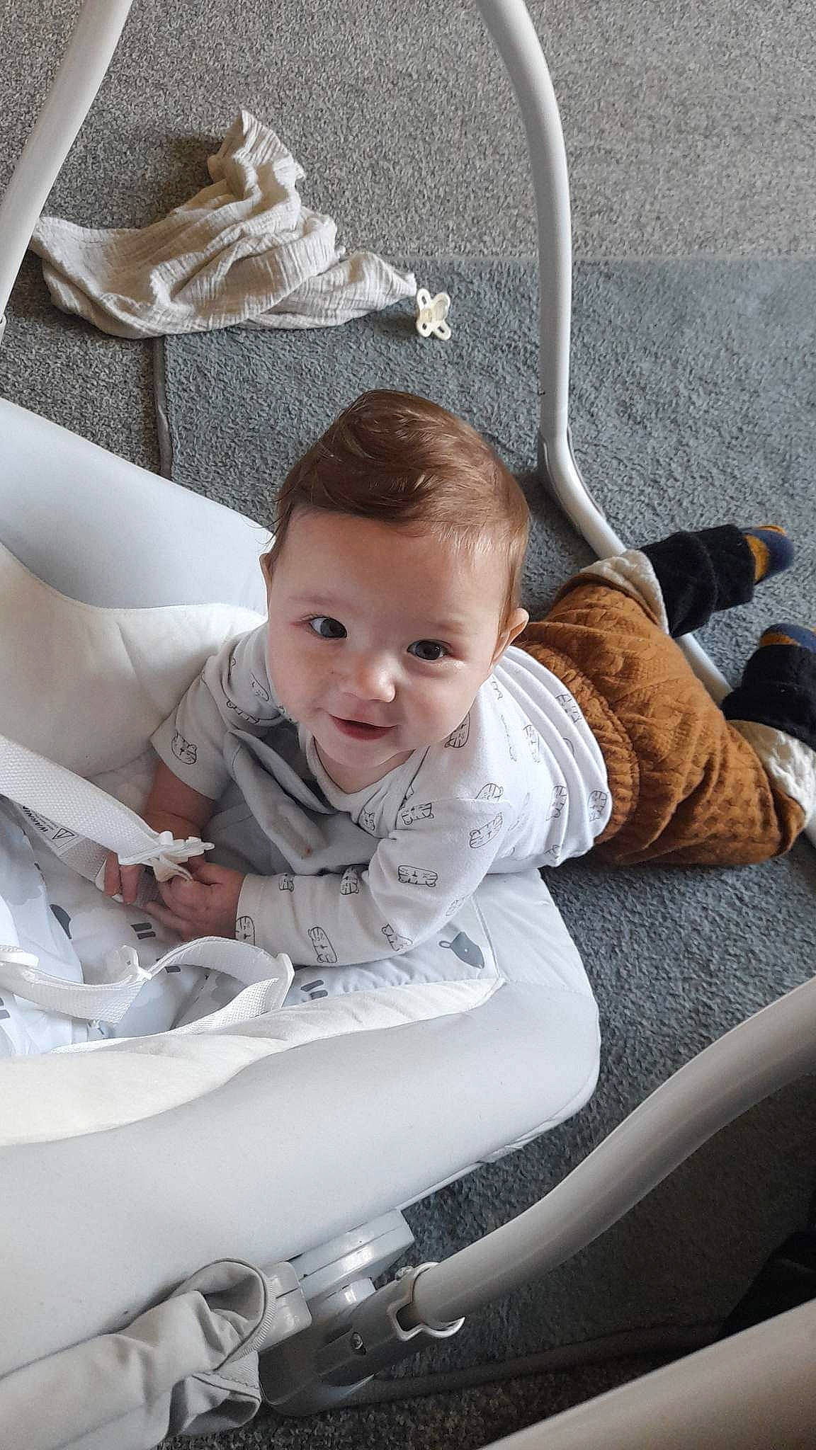 Kobi joined the competition — help win amazing prizes! automotive_design, baby, baby_products, chair, child, comfort, flash_photography, flooring, fun, hairstyle, happy, linens, mammal, person, room, sitting, smile, textile, toddler, vertebrate