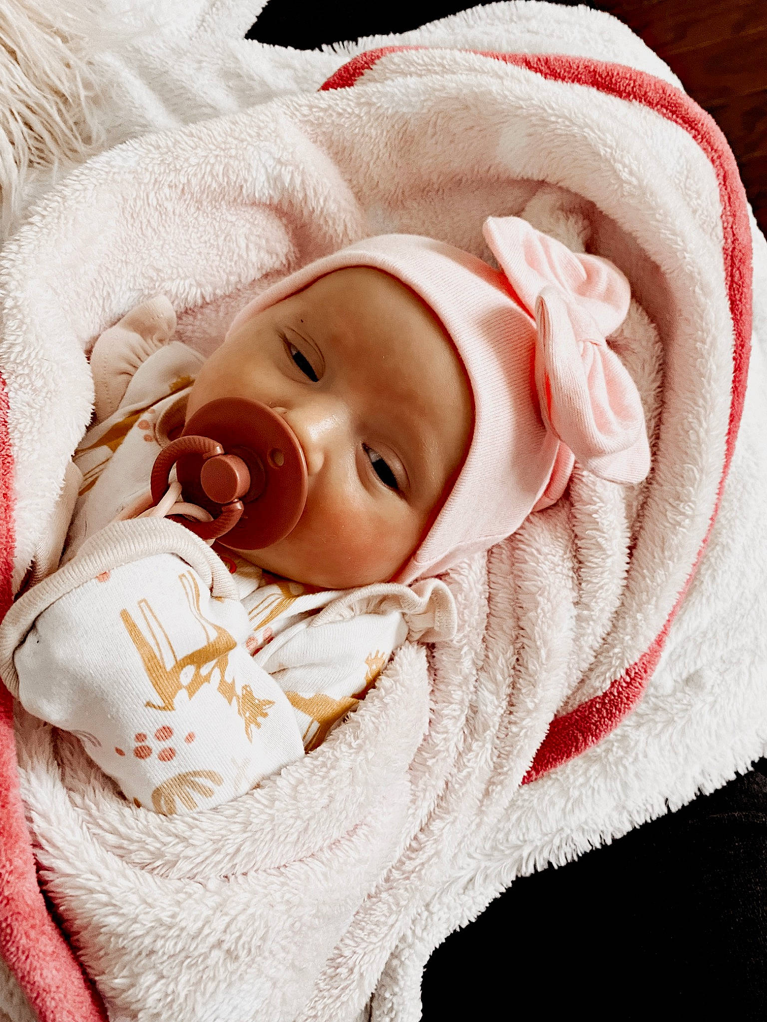 Paisley Grace is registered to the contest to win money with this photo: baby, baby_products, baby_sleeping, baby_toddler_clothing, cheek, child, comfort, eyebrow, eyelash, fashion_accessory, grass, happy, headgear, headwear, linens, lip, nose, peach, person, skin