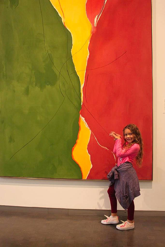 Kaylin is registered to the contest to win money with this photo: art, joy, modern_art, person, red, visual_arts, wall