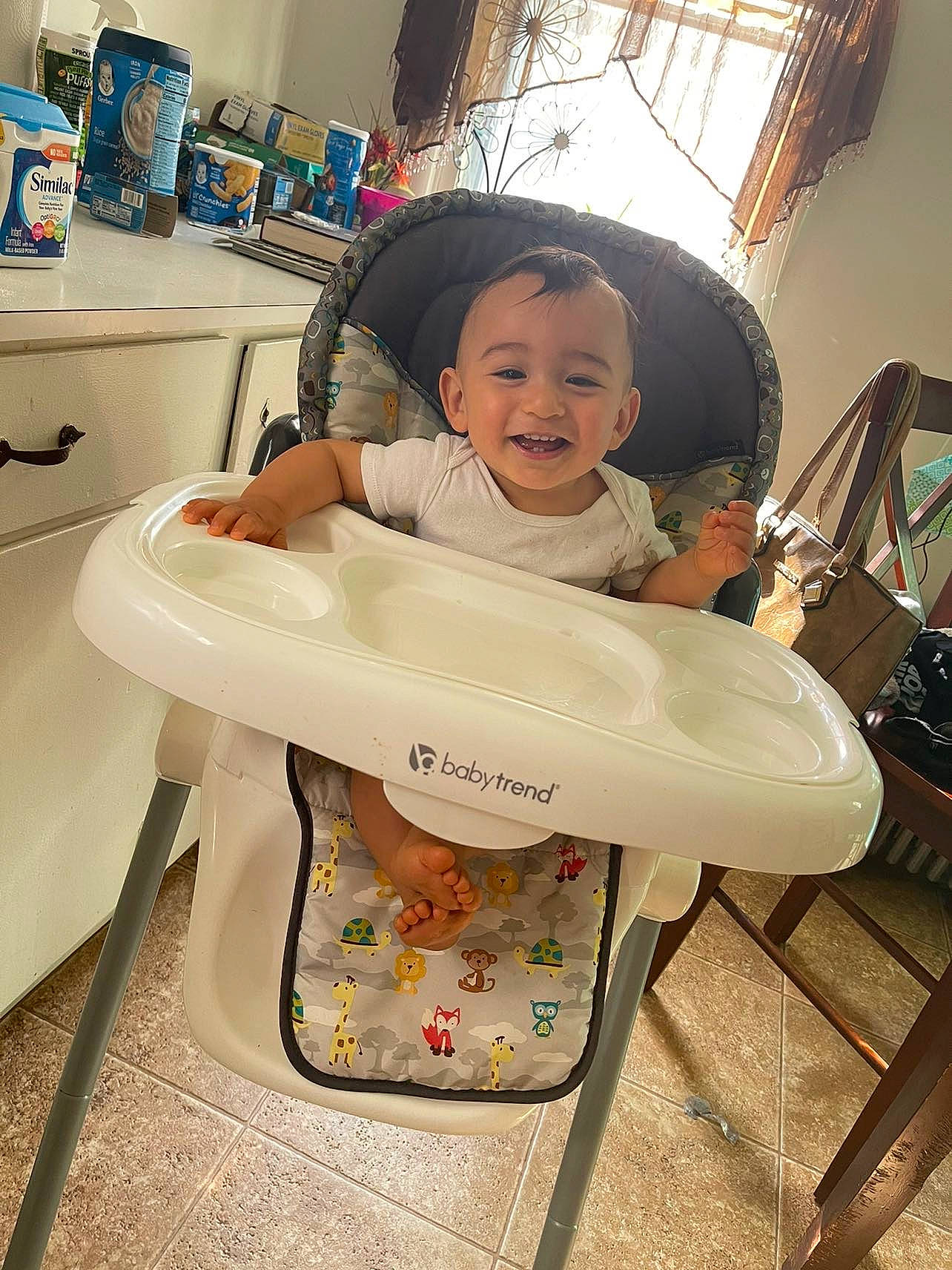 Kenzo is registered to the contest to win money with this photo: baby, baby_carriage, baby_products, baby_safety, baby_toddler_clothing, beauty, chair, child, comfort, cool, fun, happy, joy, kitchen_appliance, leisure, person, room, sitting, skin, smile
