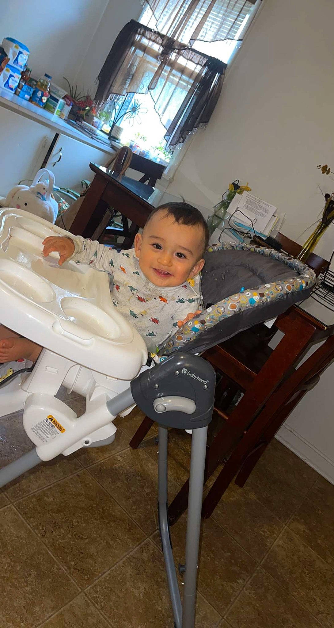 Kenzo joined the competition — help win amazing prizes! baby, baby_products, baby_safety, baby_toddler_clothing, chair, child, comfort, eye, flooring, joy, knee, lap, person, picture_frame, room, service, sitting, skin, smile, toddler