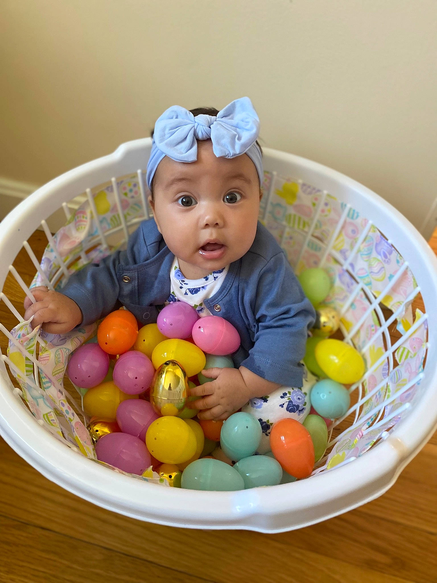 Lailah joined the competition — help win amazing prizes! baby, baby_products, baby_toddler_clothing, baby_toys, basket, bowl, child, food_group, fruit, happy, headwear, natural_foods, person, product, room, sitting, storage_basket, superfood, surprise, toddler