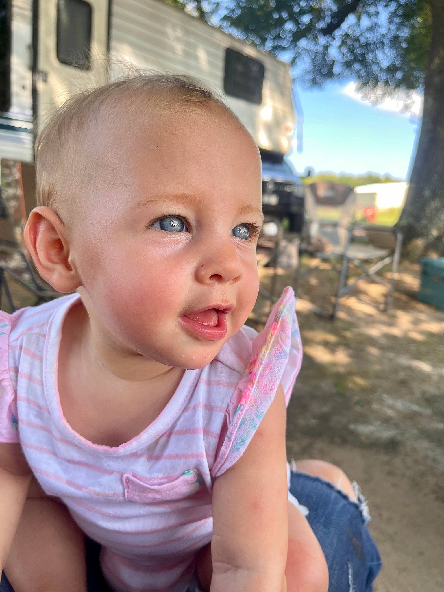 Aspyn is registered to the contest to win money with this photo: baby, baby_toddler_clothing, blue, child, chin, clothing, eyelash, fun, happy, iris, leisure, lip, nose, person, public_space, recreation, skin, sky, t_shirt, toddler