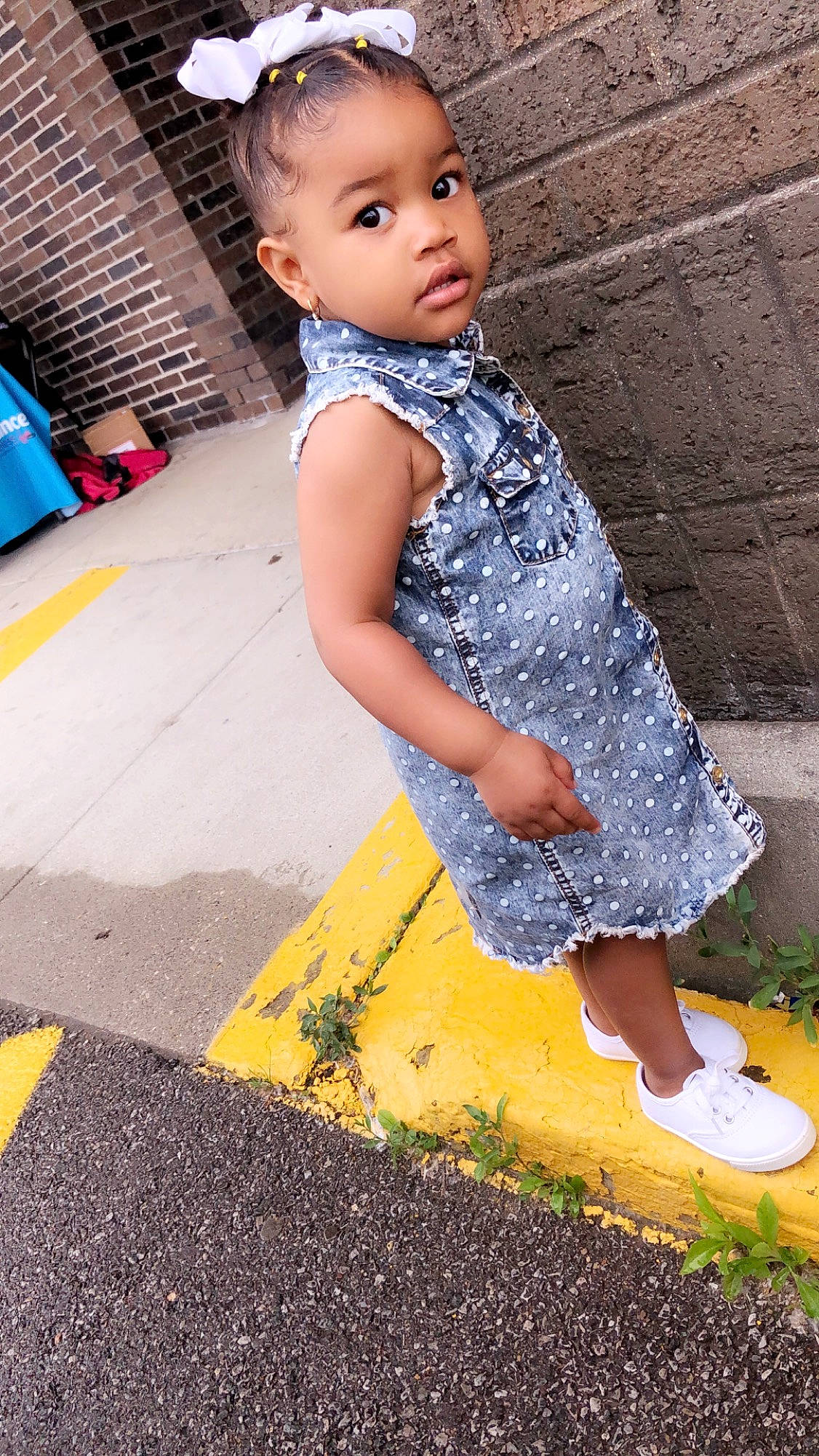 Karmina is registered to the contest to win money with this photo: beauty, child, child_model, dress, footwear, fun, pattern, person, photography, play, public_space, smile, summer, toddler, vacation, yellow