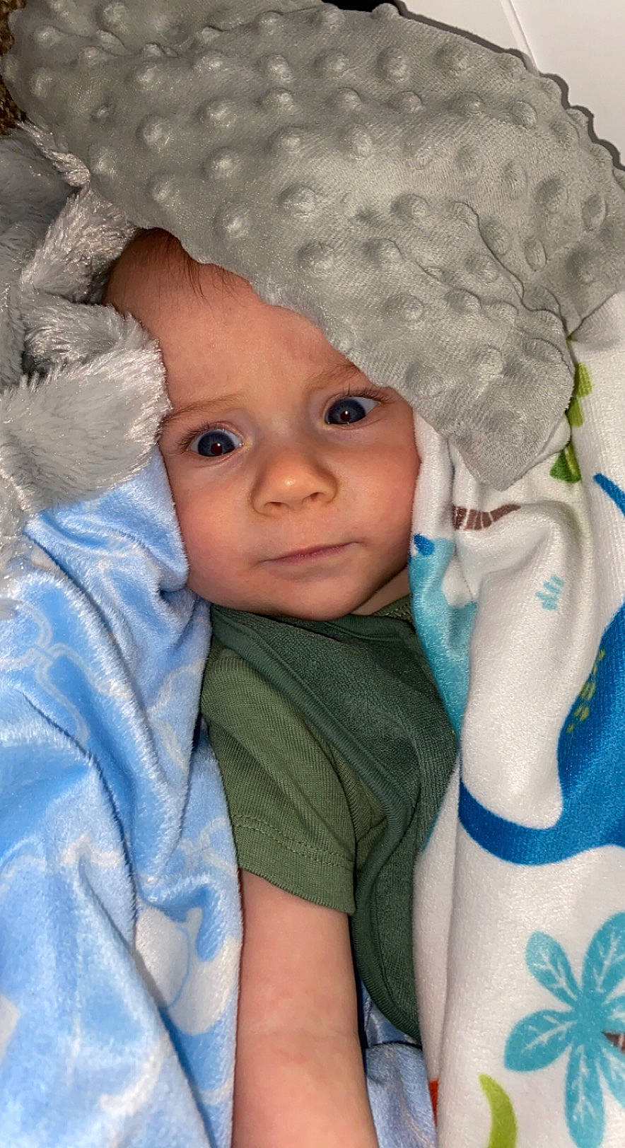 Charles is registered to the contest to win money with this photo: baby, baby_toddler_clothing, cap, cheek, child, chin, eye, eyebrow, fashion_accessory, fur, headgear, headwear, iris, knit_cap, nose, outerwear, person, skin, textile, toddler