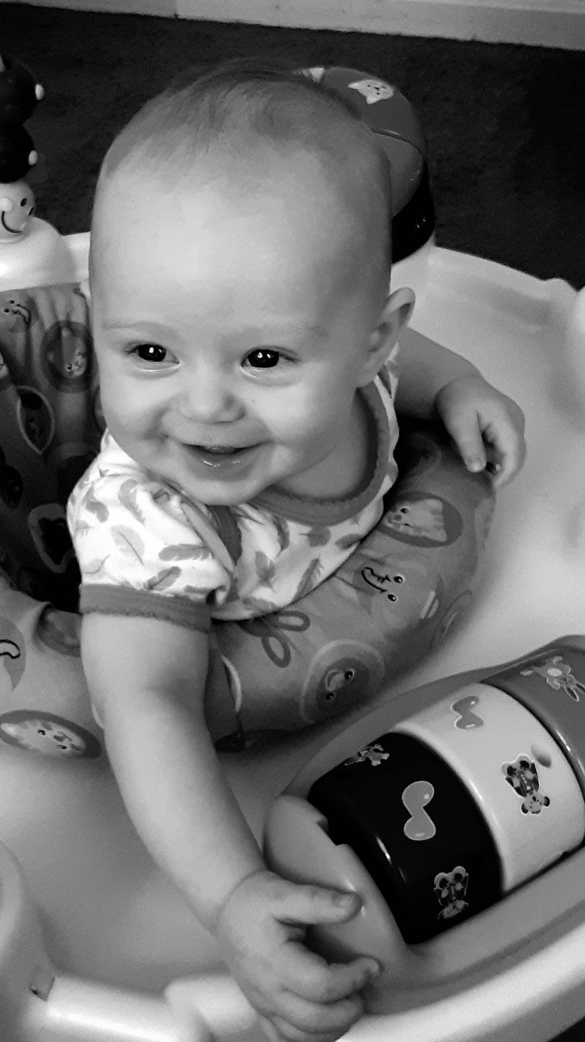 Rhea is registered to the contest to win money with this photo: baby, baby_products, black_and_white, child, joy, person, photography, product, style, toddler