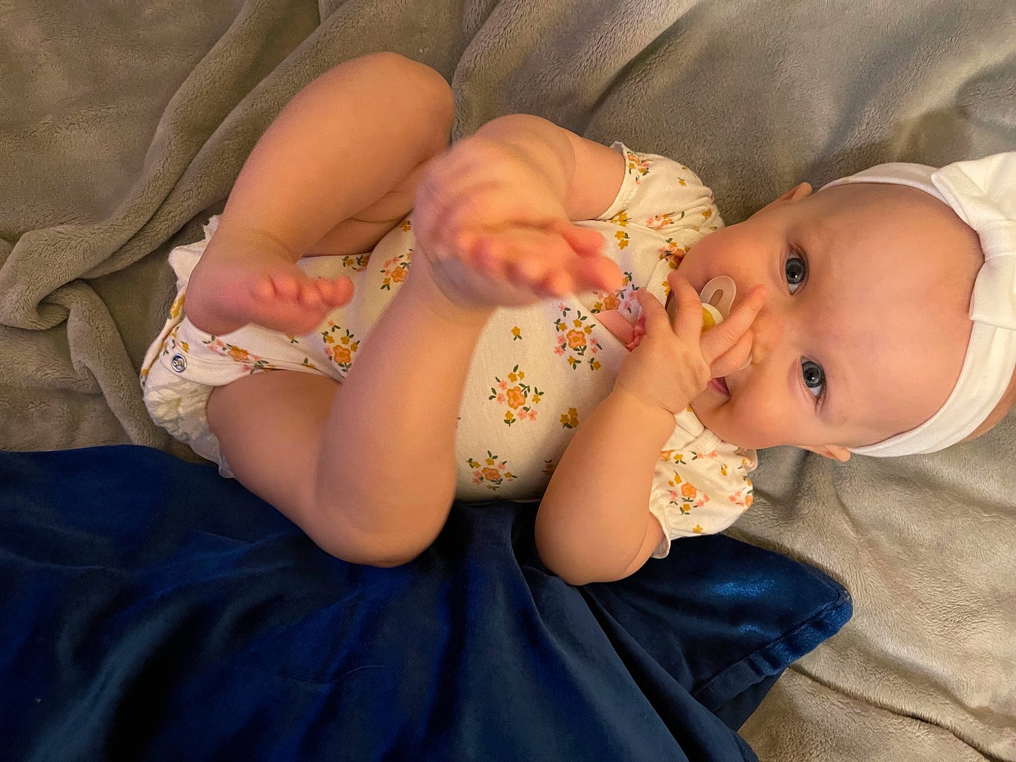 Kitana joined the competition — help win amazing prizes! arm, baby, baby_toddler_clothing, cheek, dress, eye, finger, gesture, grass, hand, head, human_body, iris, lip, nail, pattern, person, skin, sleeve, textile
