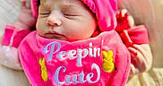 Raelynn is registered to the contest to win money with this photo: baby, blanket, bonnet, clothing, cushion, face, hat, head, homedecor, newborn, person, photography, portrait, quilt, sleeping, yawning
