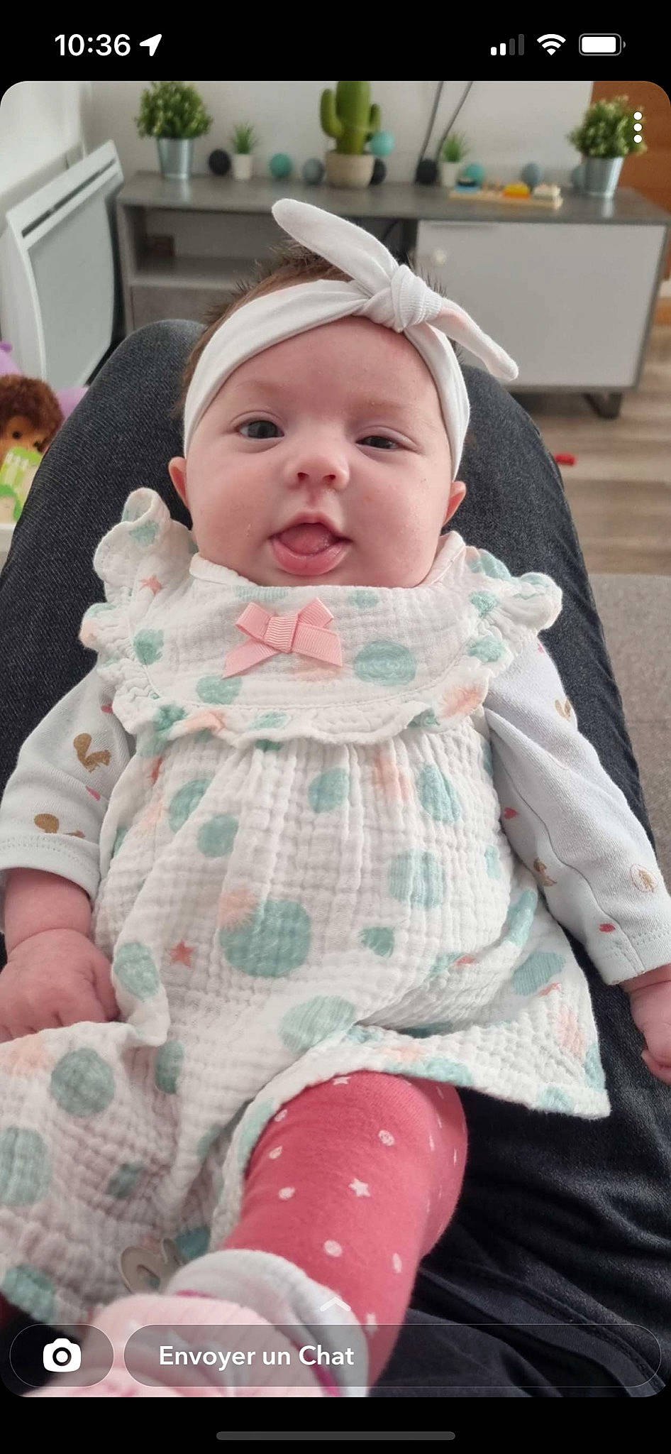 Myla participe au concours pour gagner de l'argent avec cette photo : baby, baby_toddler_clothing, cheek, child, comfort, dress, event, face, fun, happy, head, headwear, iris, lip, mammal, mouth, person, pink, skin, sleeve