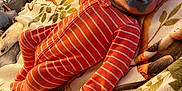 Skylar is registered to the contest to win money with this photo: animal_print, baby, blanket, butterfly, child, cozy, cute, face, giraffe, head, indoor, infant, leaf, lying_down, monkey, newborn, onesie, pacifier, person, striped_clothing