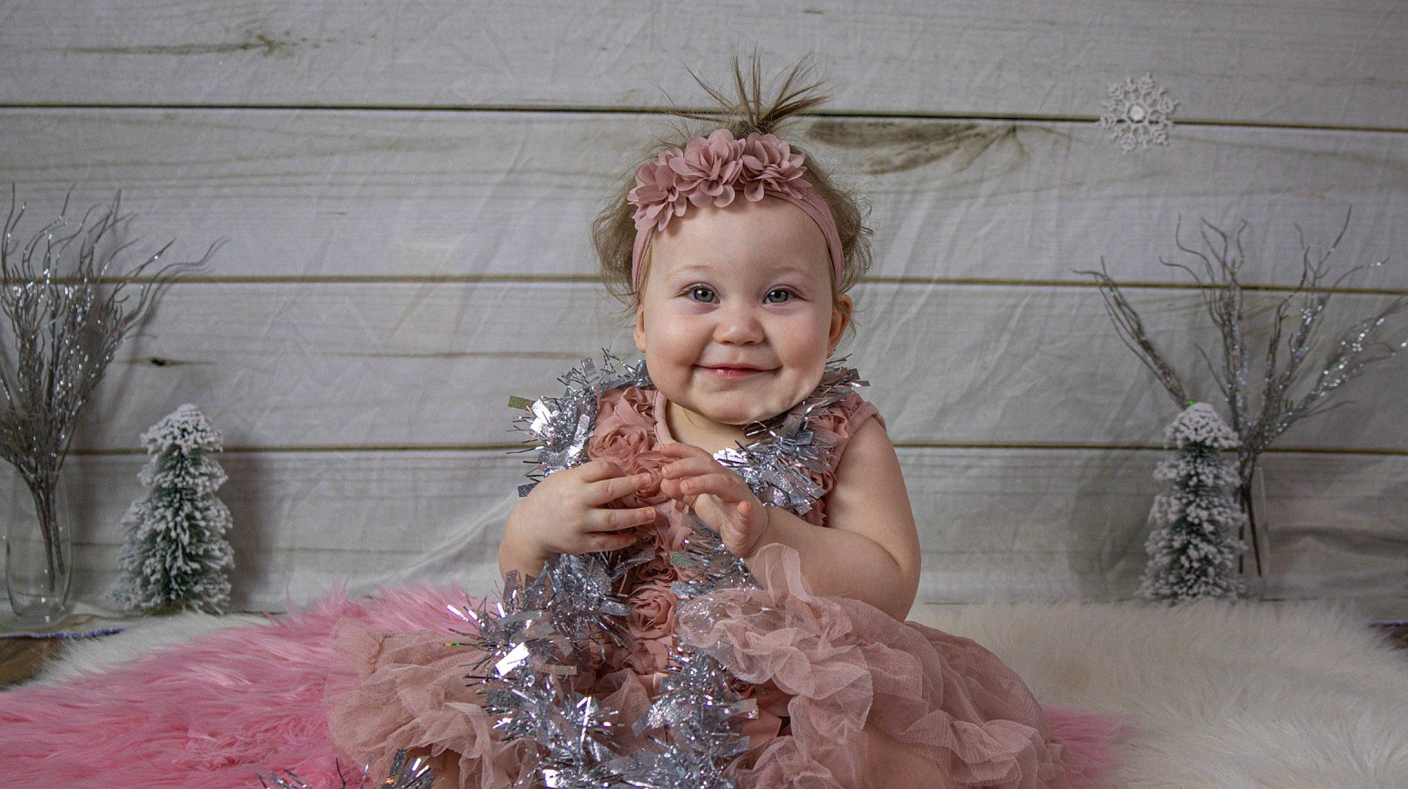 Marisol is registered to the contest to win money with this photo: baby_toddler_clothing, bridal_accessory, child, dress, embellishment, event, fashion_accessory, fashion_design, feather, fun, hair_accessory, happy, headband, headpiece, jewellery, joy, magenta, person, pink, smile