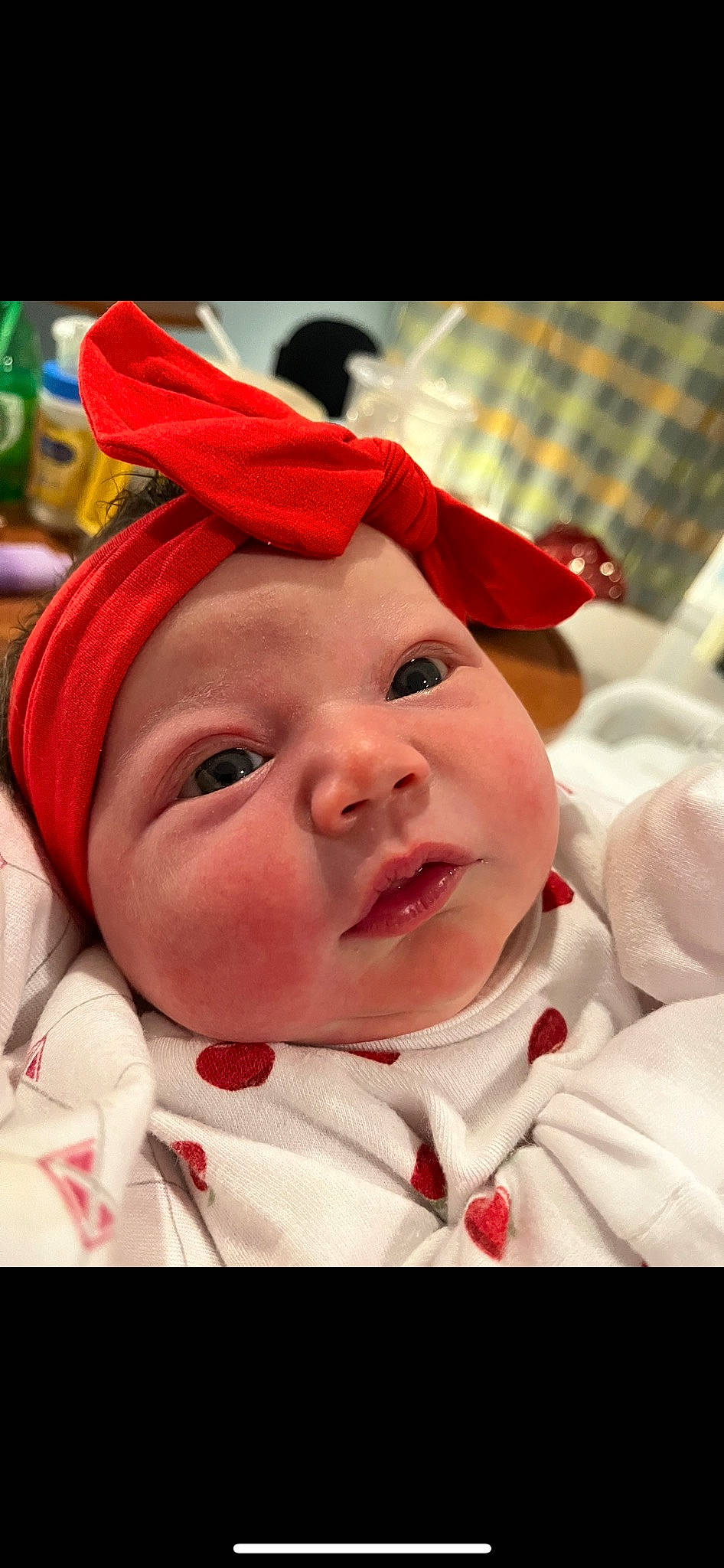 Marisol joined the competition — help win amazing prizes! baby, cap, cheek, child, christmas, costume_hat, event, fashion_accessory, fictional_character, fun, happy, hat, head, headwear, holiday, lip, person, red, santa_claus, skin