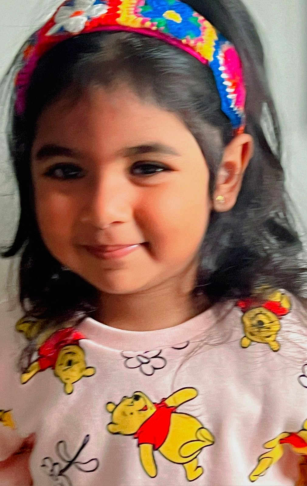 Daanya Zainab joined the competition — help win amazing prizes! child, smile, headband, colorful, winnie_the_pooh, shirt, portrait, cute, happy, face, young, indoors, person, clothing, hair, earrings, playful, casual, closeup, girl