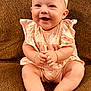 Khloe joined the competition — help win amazing prizes! baby, smiling, infant, pink_headband, pink_outfit, sitting, couch, happy, cute, child, portrait, indoors, skin, feet, hands, face, headwear, texture, comfortable, young